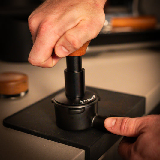 What is a Self-Leveling Coffee Tamper?